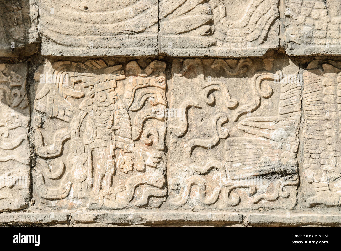 CHICHEN ITZA, Mexico - Winged warrior carving in a stone wall at Chichen Itza Mayan ruins, Mexico. Stock Photo
