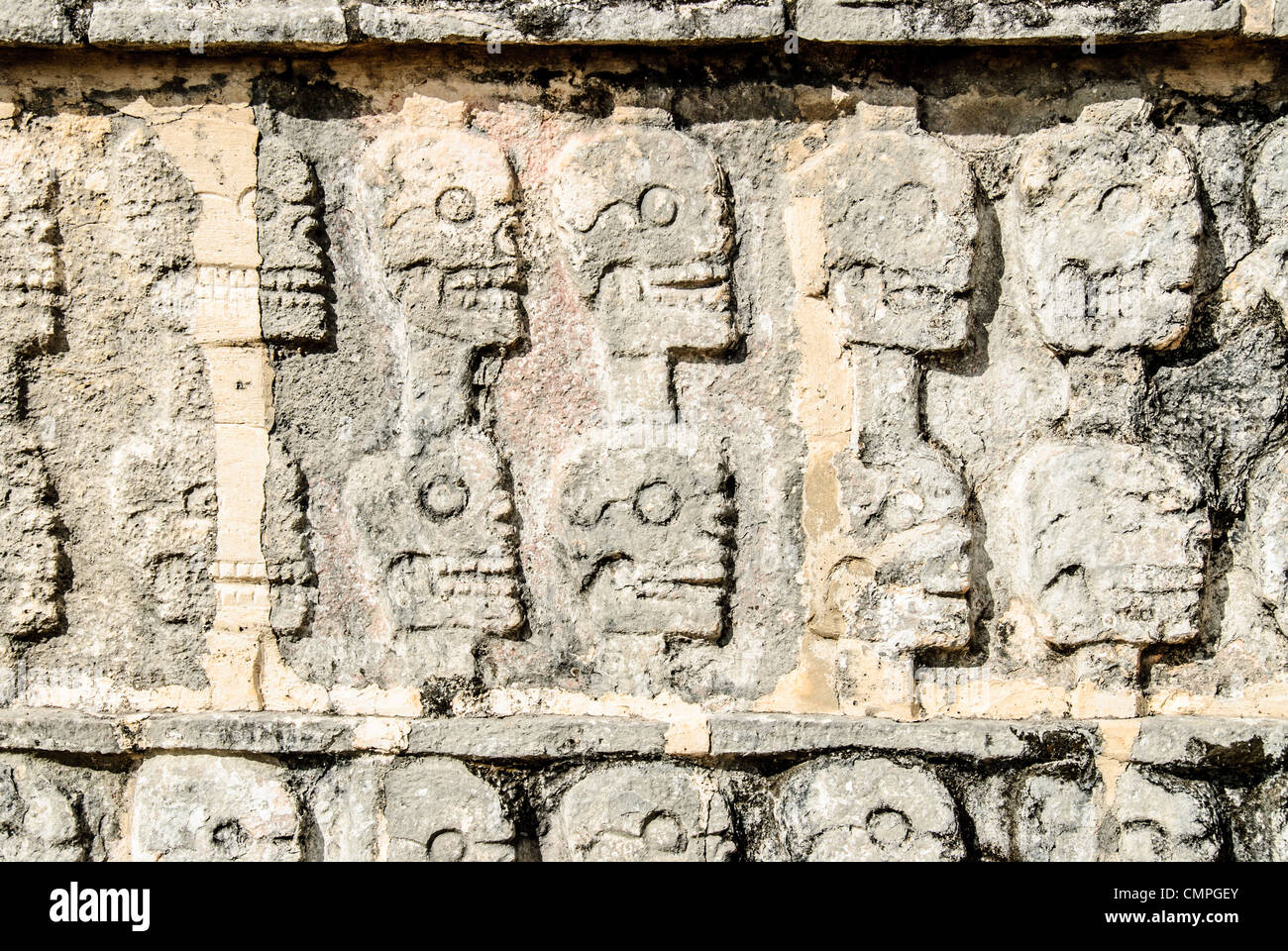 CHICHEN ITZA, Mexico - Depiction of skulls carved in stone at Chichen Itza, Mexico. Stock Photo
