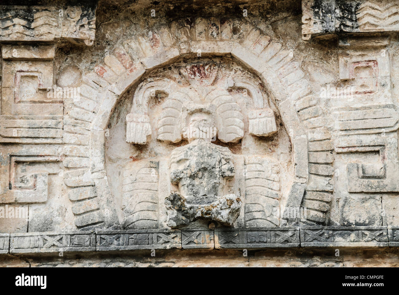 CHICHEN ITZA, Mexico - A carving of a Mayan king in the wall of one of the buildings at Chichen Itza Mayan Ruins in Mexico's Yucatan Peninsula Stock Photo