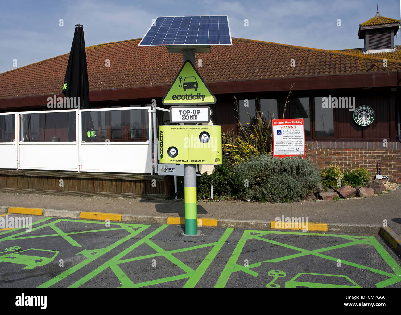 An electric car recharging point at Sedgemoor service station on the M5 in Somerset, UK Stock Photo