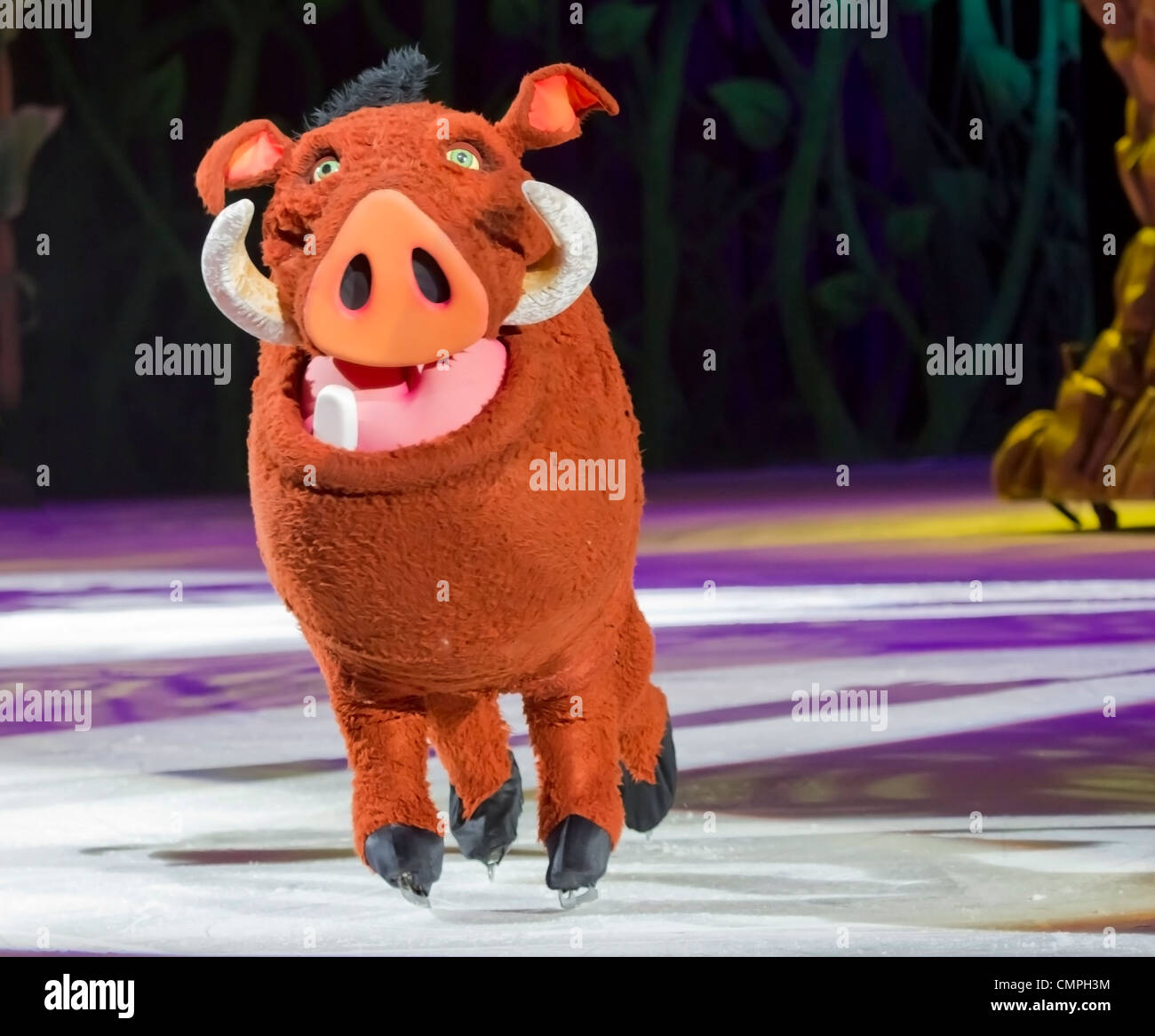 GREEN BAY, WI - MARCH 10: Pumbaa the warthog from The Lion King on skates at the Disney on Ice Treasure Trove show. Stock Photo