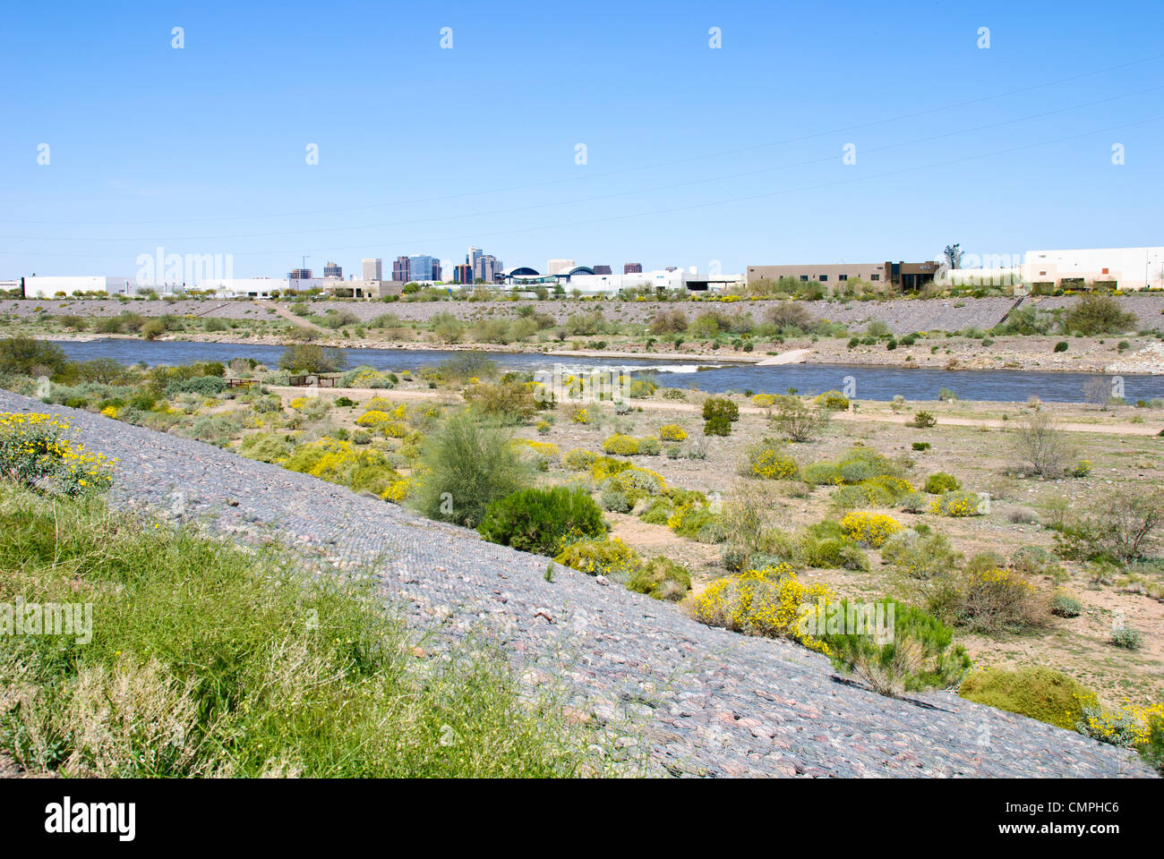 Salt River with downtown Phoenix skyline in the background Stock Photo