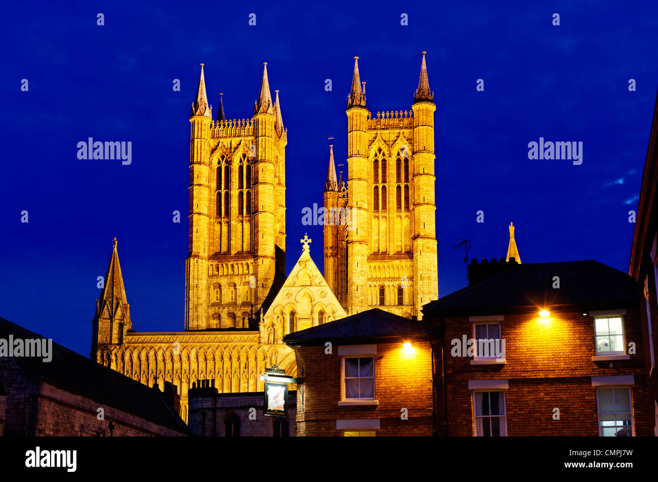 The cathedral and Cathedral Square in Lincoln UK at night Stock Photo