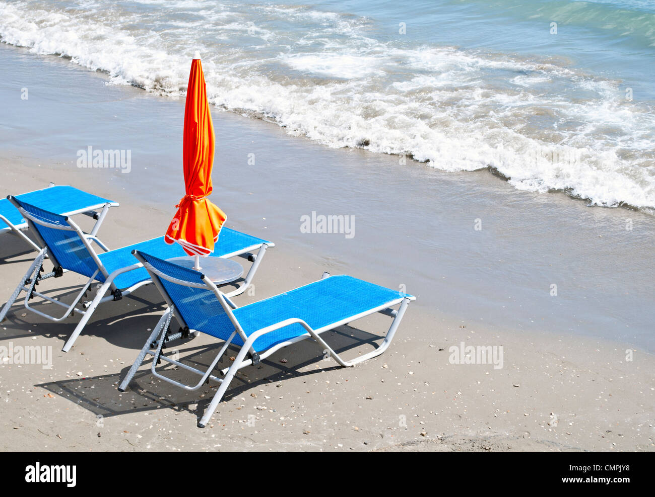Sun beds on beach Stock Photo Alamy