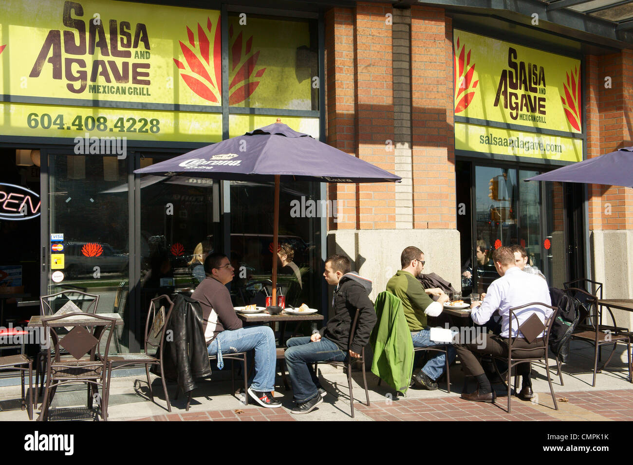 People eating outdoors at Salsa and Agave Mexican restaurant in Yaletown, Vancouver, British Columbia, Canada Stock Photo