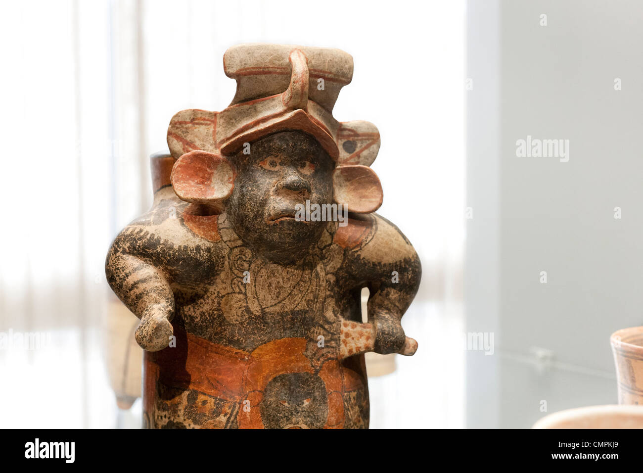 Mayan ceramic vase of a hunchback dwarf. Chilean Museum for Pre-Columbian Art, Museo Chileno de Arte Precolombino Santiago Chile Stock Photo