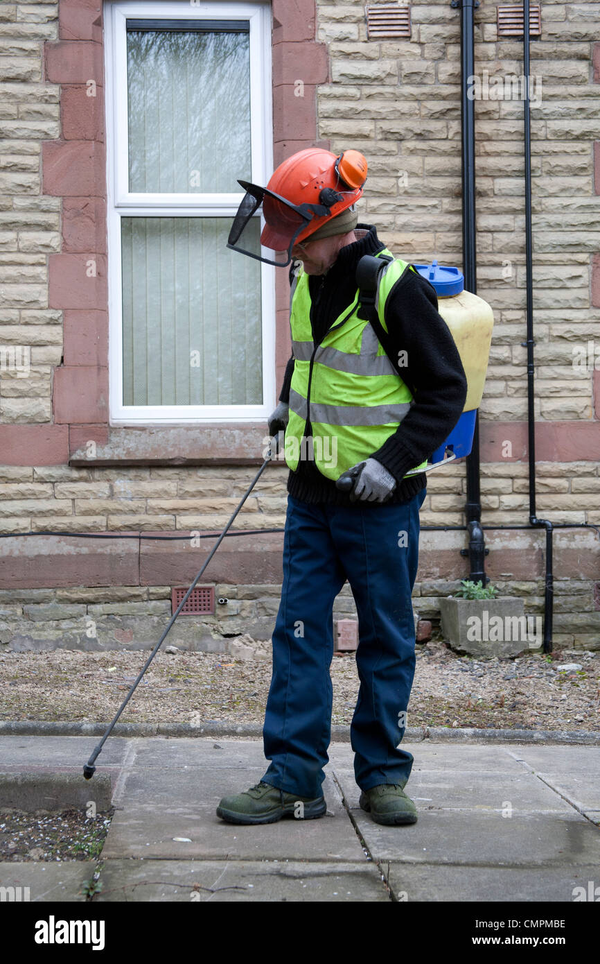 Using weed killer on a lawn hires stock photography and images Alamy