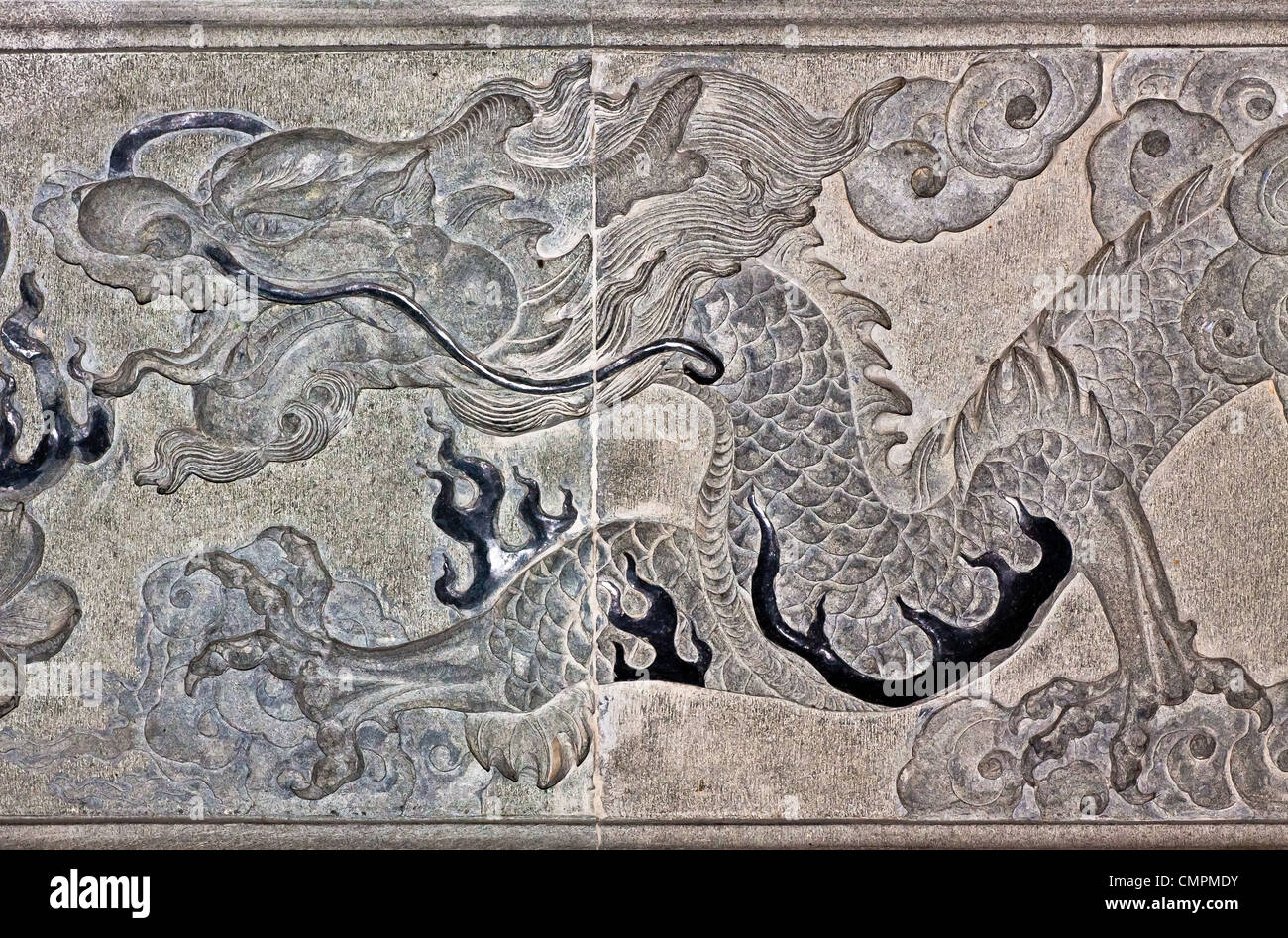 Dragon carve on wall expressing power and status in ancient China. Stock Photo