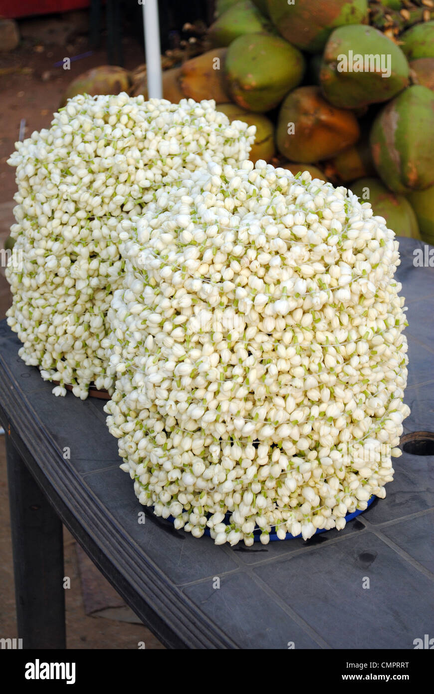 garlends made of jasmine flowers kept at a street shop in kerala, india