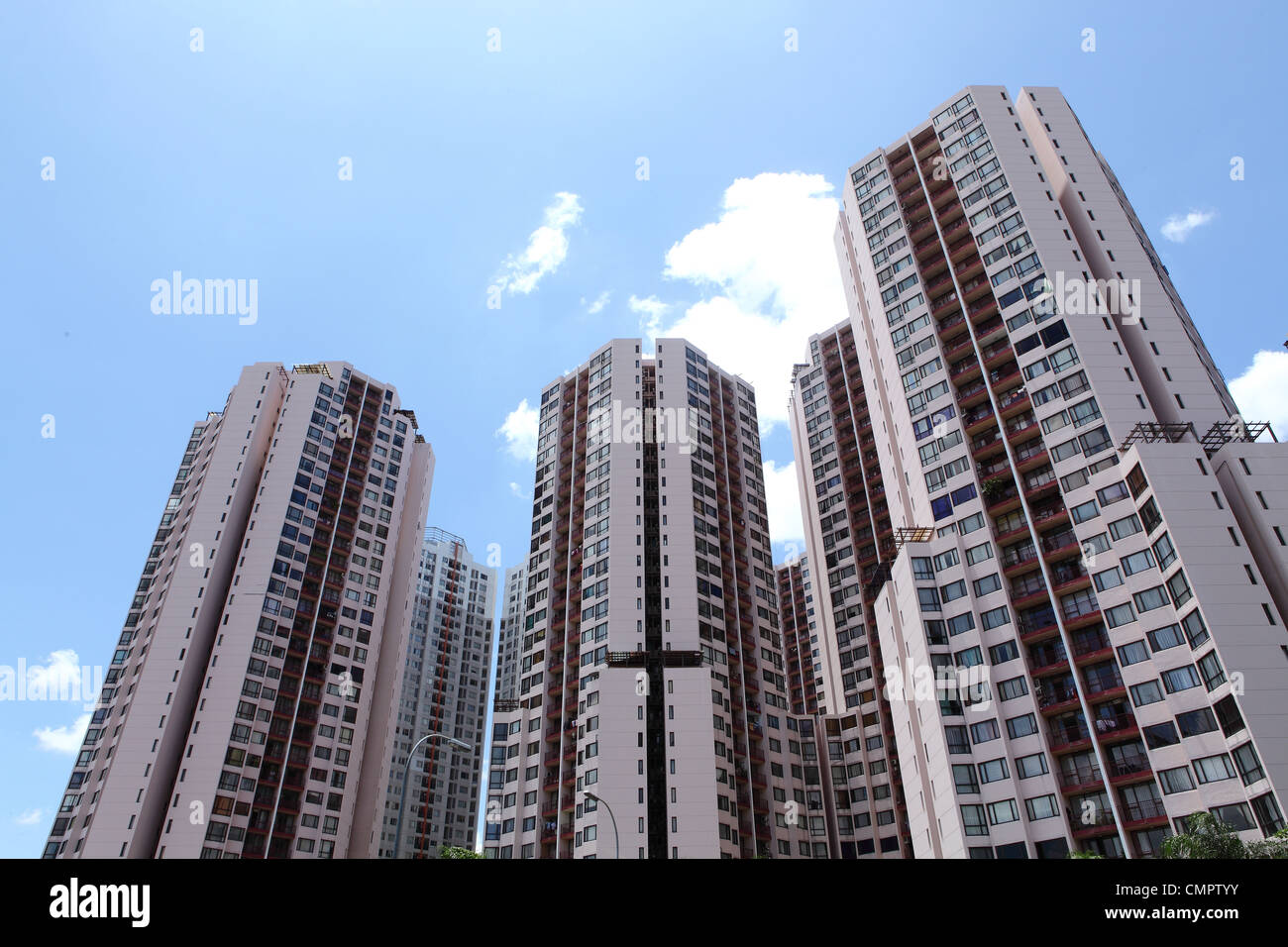 apartment tower with blue sky background Stock Photo - Alamy