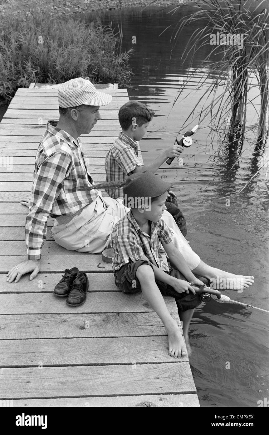 Young boys fishing tackle Black and White Stock Photos & Images - Alamy