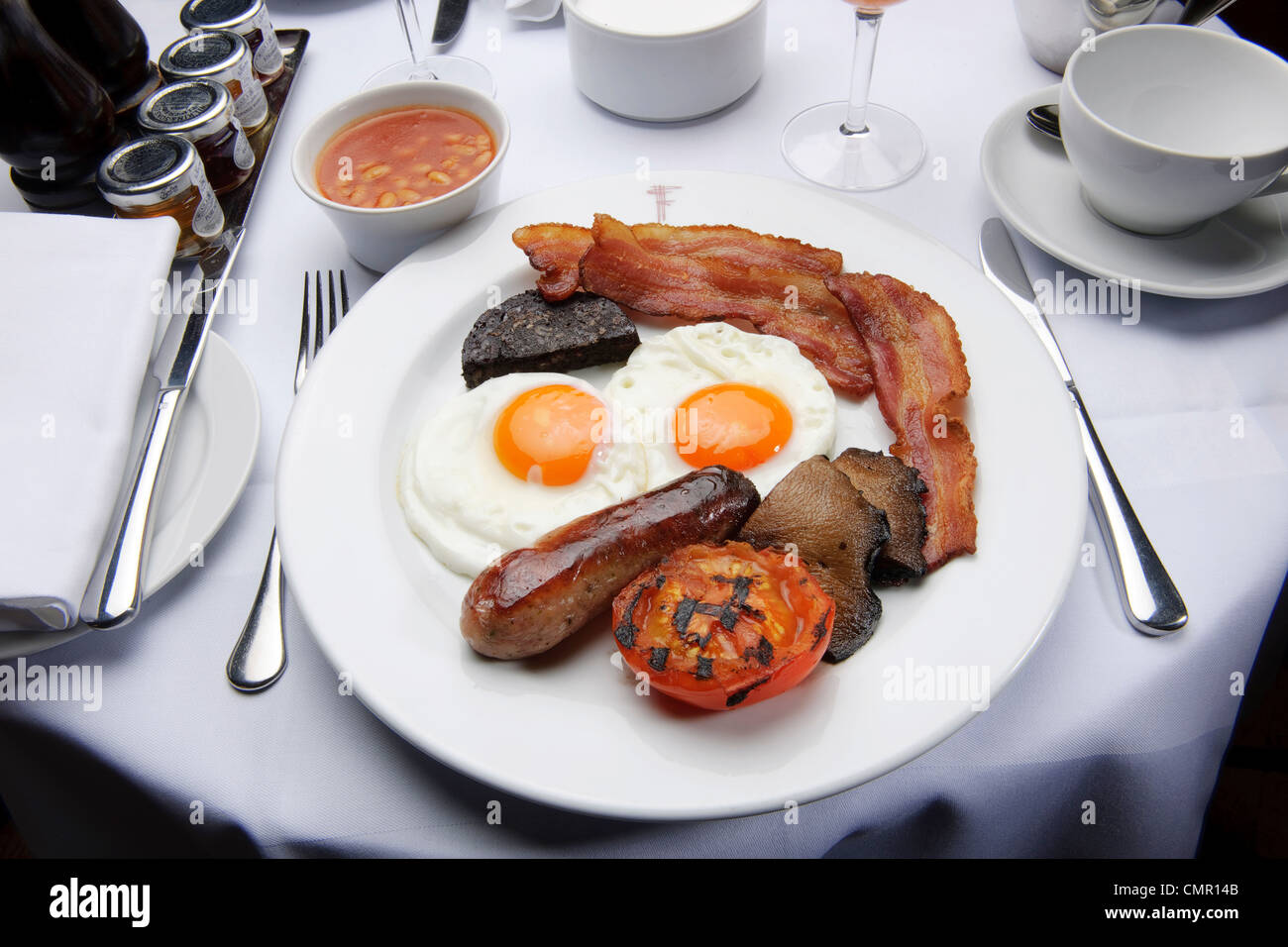 full English breakfast fry up egg and bacon restaurant unhealthy food greasy spoon Stock Photo