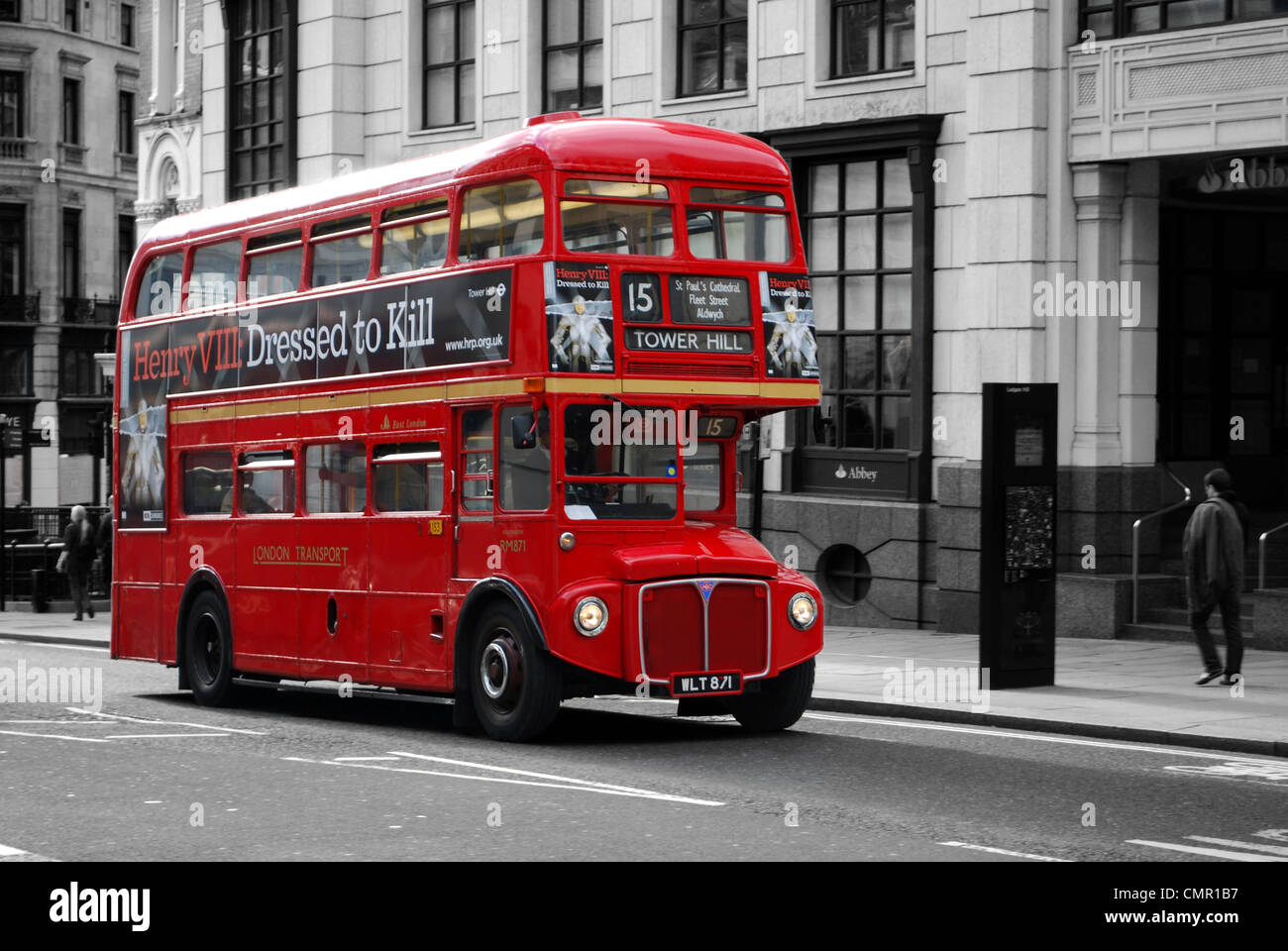 Routemaster on Lugate Hill, City of London. Bus in color colour against a monochrome background Stock Photo
