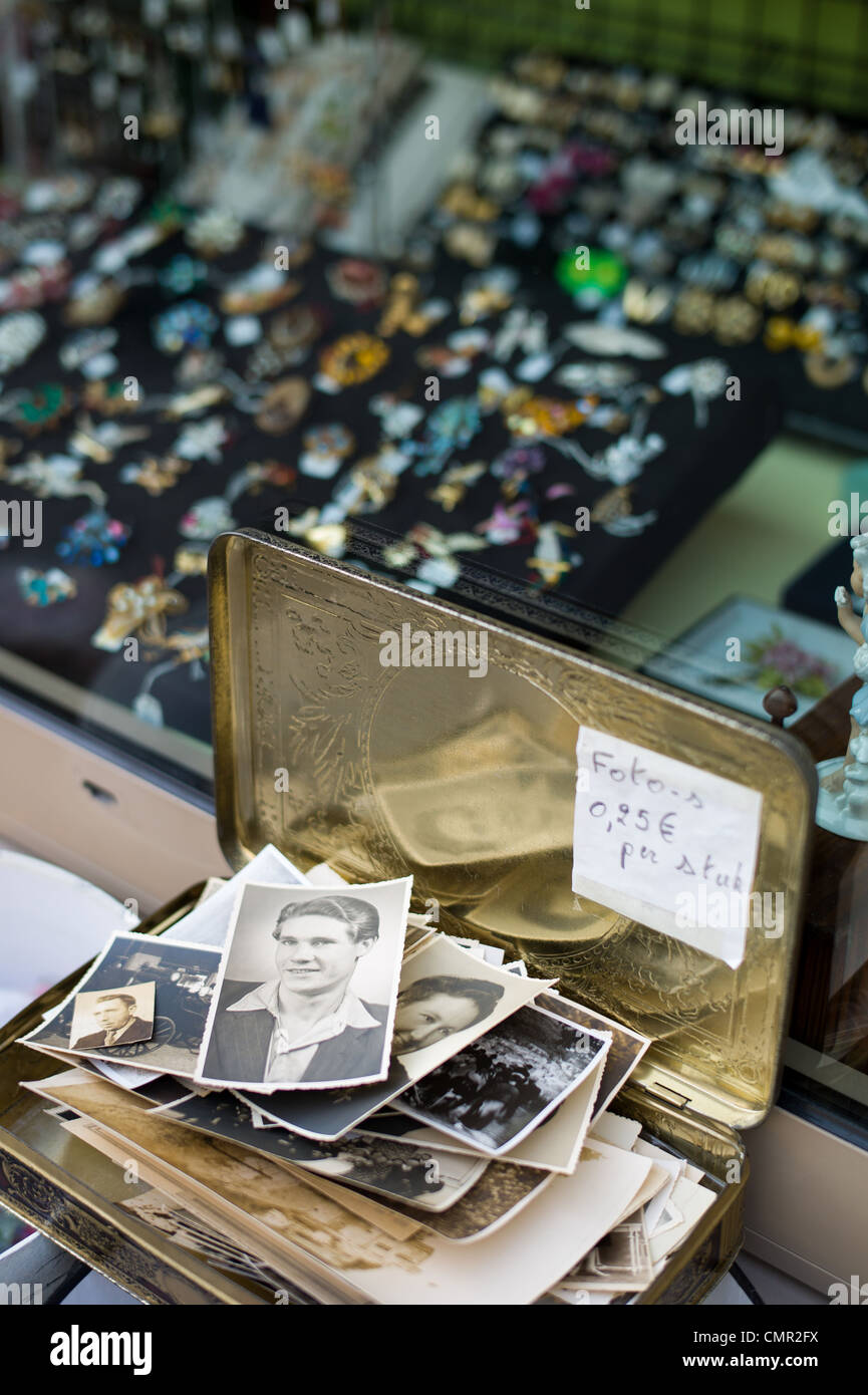 Old vintage photographs for sale outside a curiosity shop in Antwerp
