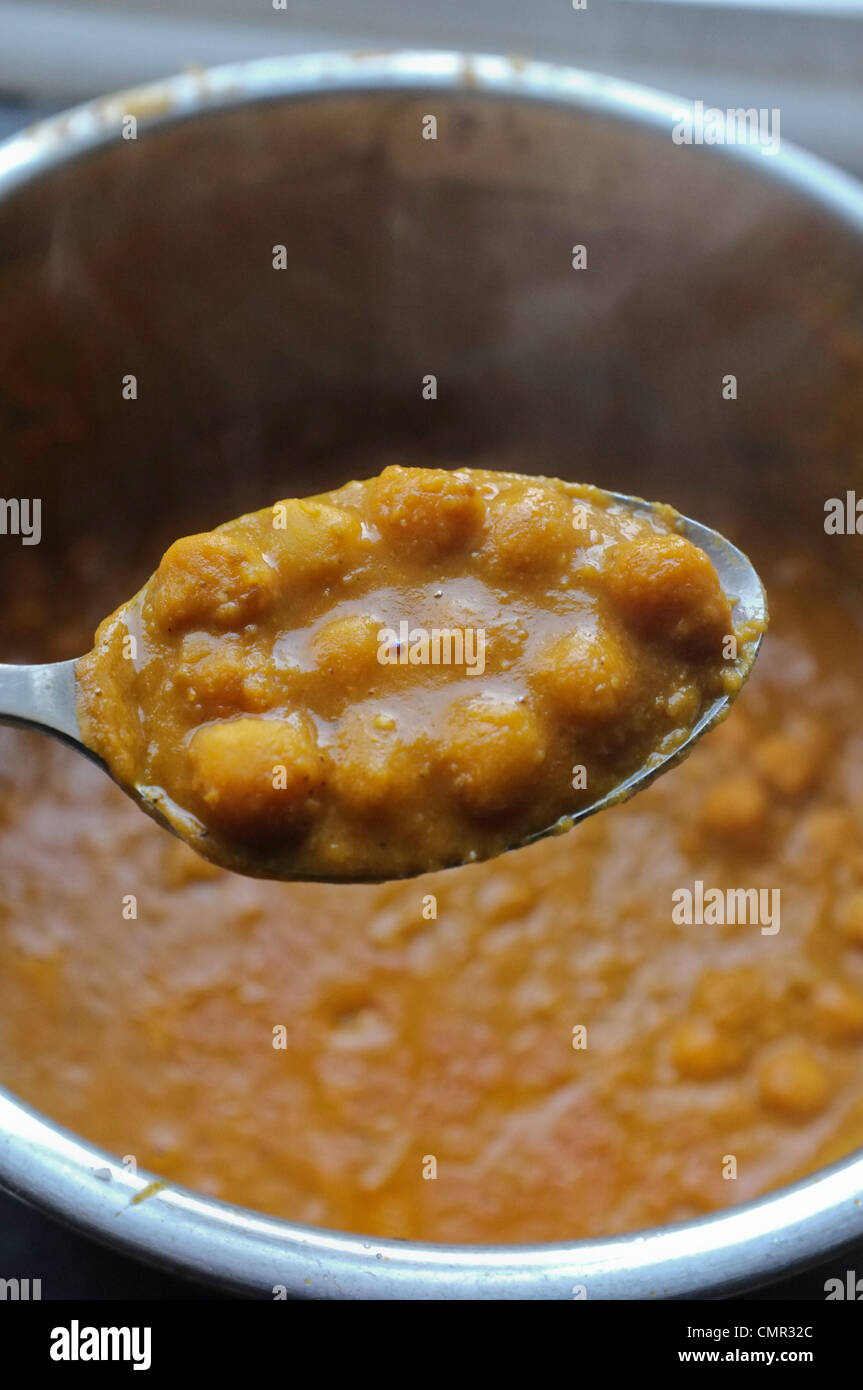 chickpea curry being cooked Stock Photo Alamy