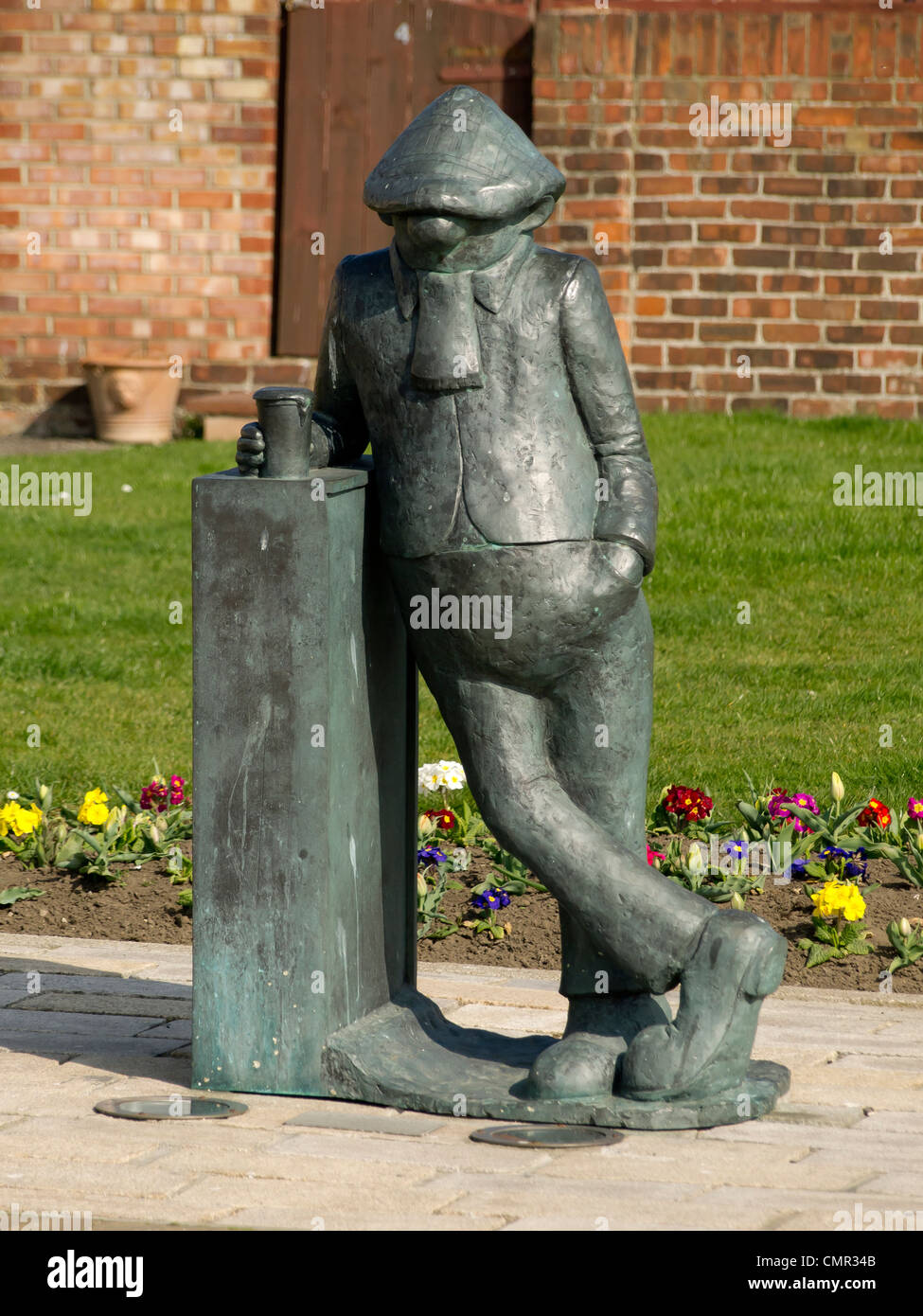 A bronze statue of  well known cartoon character Andy Capp at the Headland Hartlepool Co Durham, home of his creator Reg Smythe Stock Photo