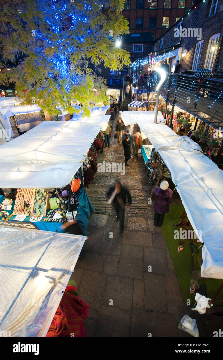 Early evening Christmas shoppers at Camden Lock Market, London Stock Photo