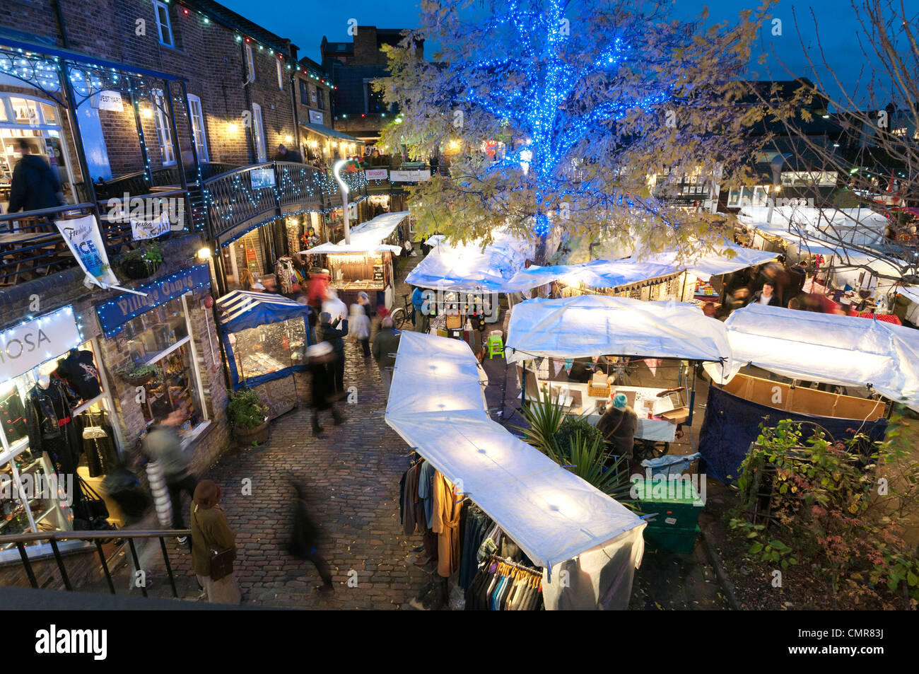 Early evening Christmas shoppers at Camden Lock Market, London, UK Stock Photo