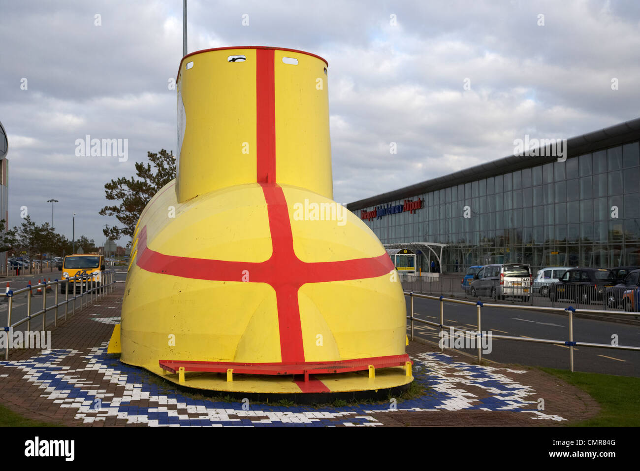 the beatles yellow submarine sculpture outside liverpool john lennon airport merseyside uk. Stock Photo
