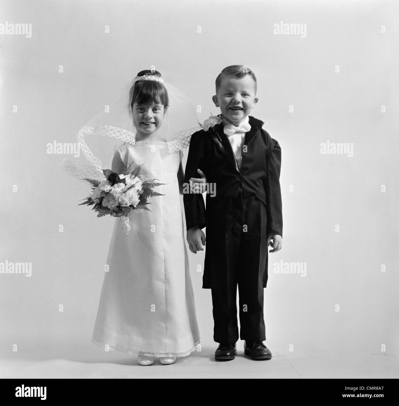 1950s CHILDREN GROOM BRIDE WEDDING Stock Photo