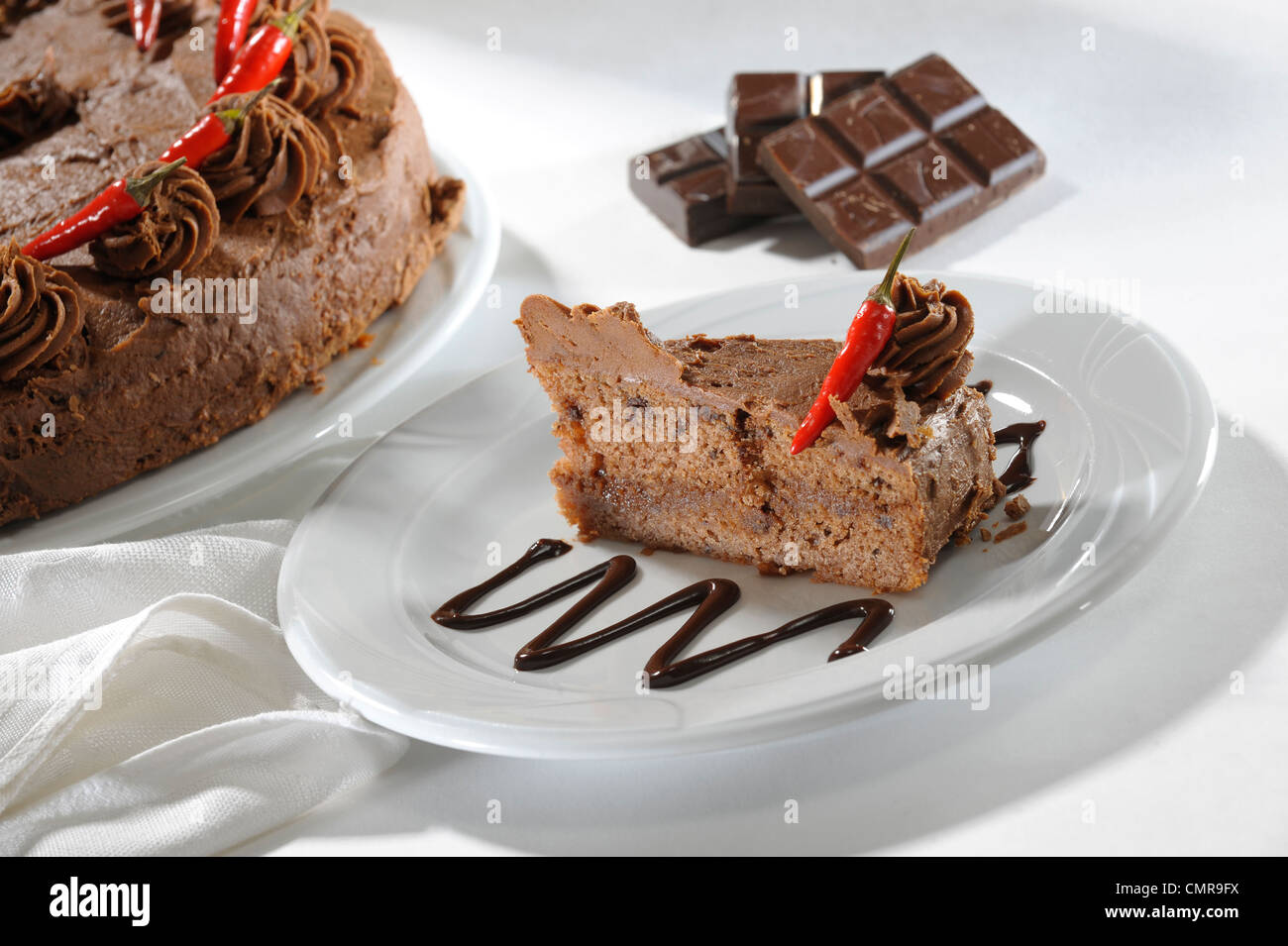 Chocolate cake with chili pepper Stock Photo Alamy