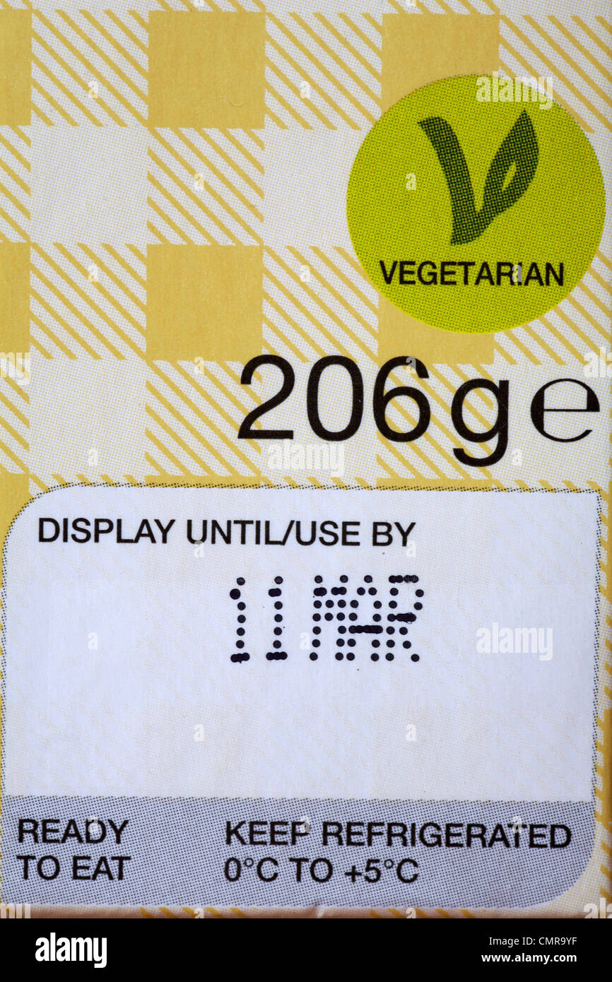 display until, use by, vegetarian symbol, vegetarian logo - information on box of cakes Stock Photo