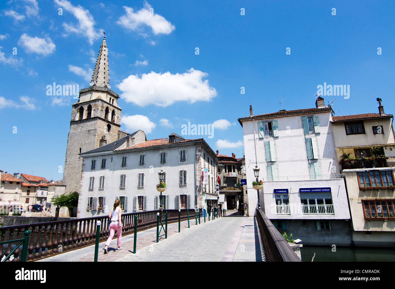 Crossing the footbridge into St. Girons in the Midi Pyrenees region of France. Stock Photo