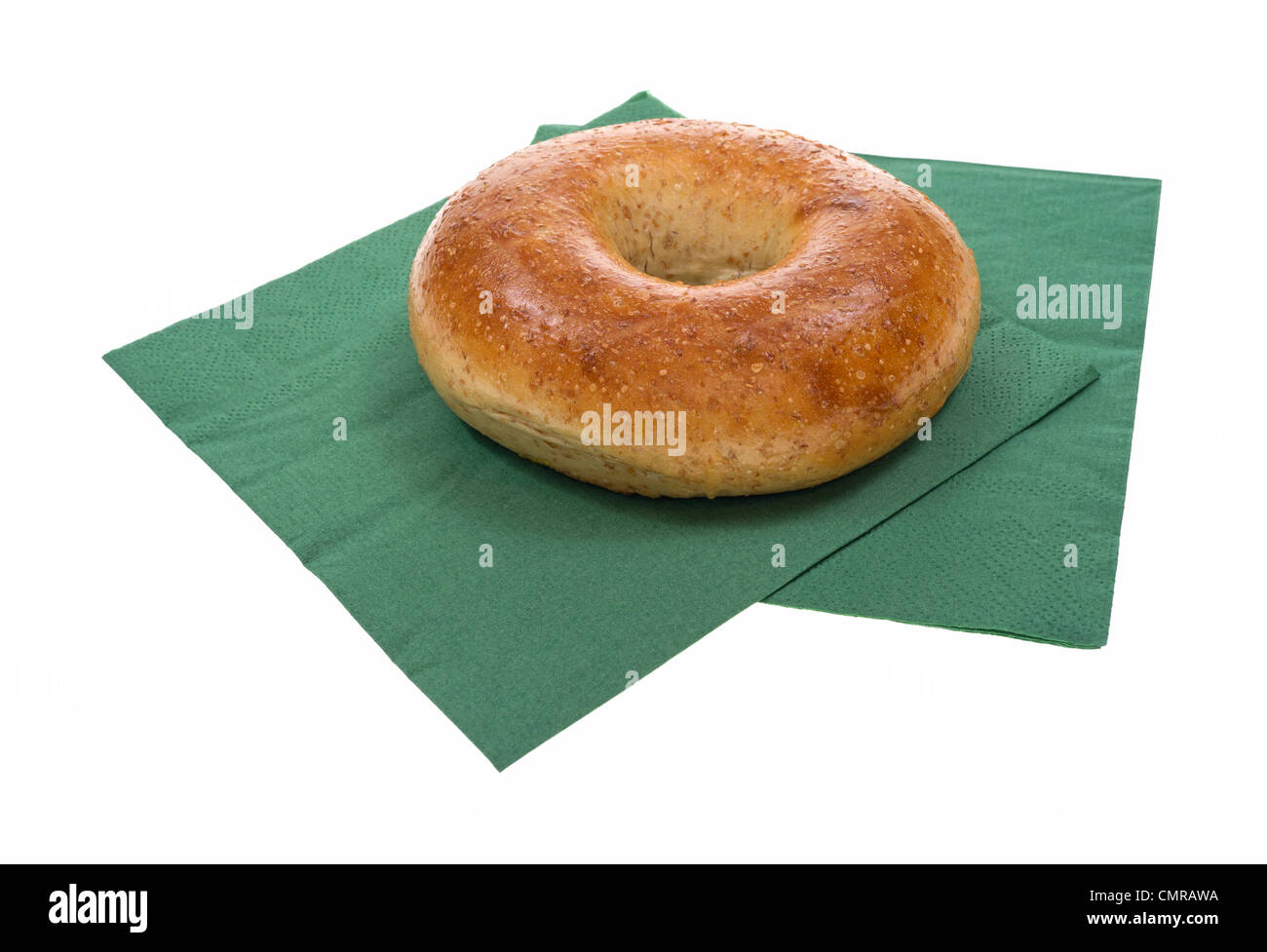 Whole grain bagel on napkin Stock Photo