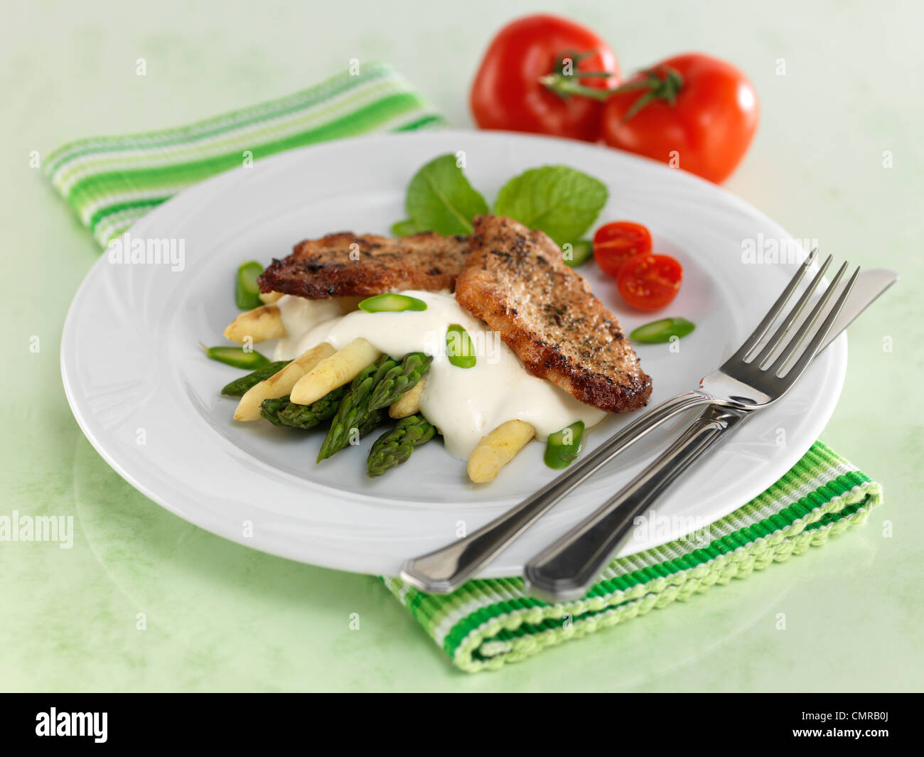 veal cutlet with asparagus Stock Photo