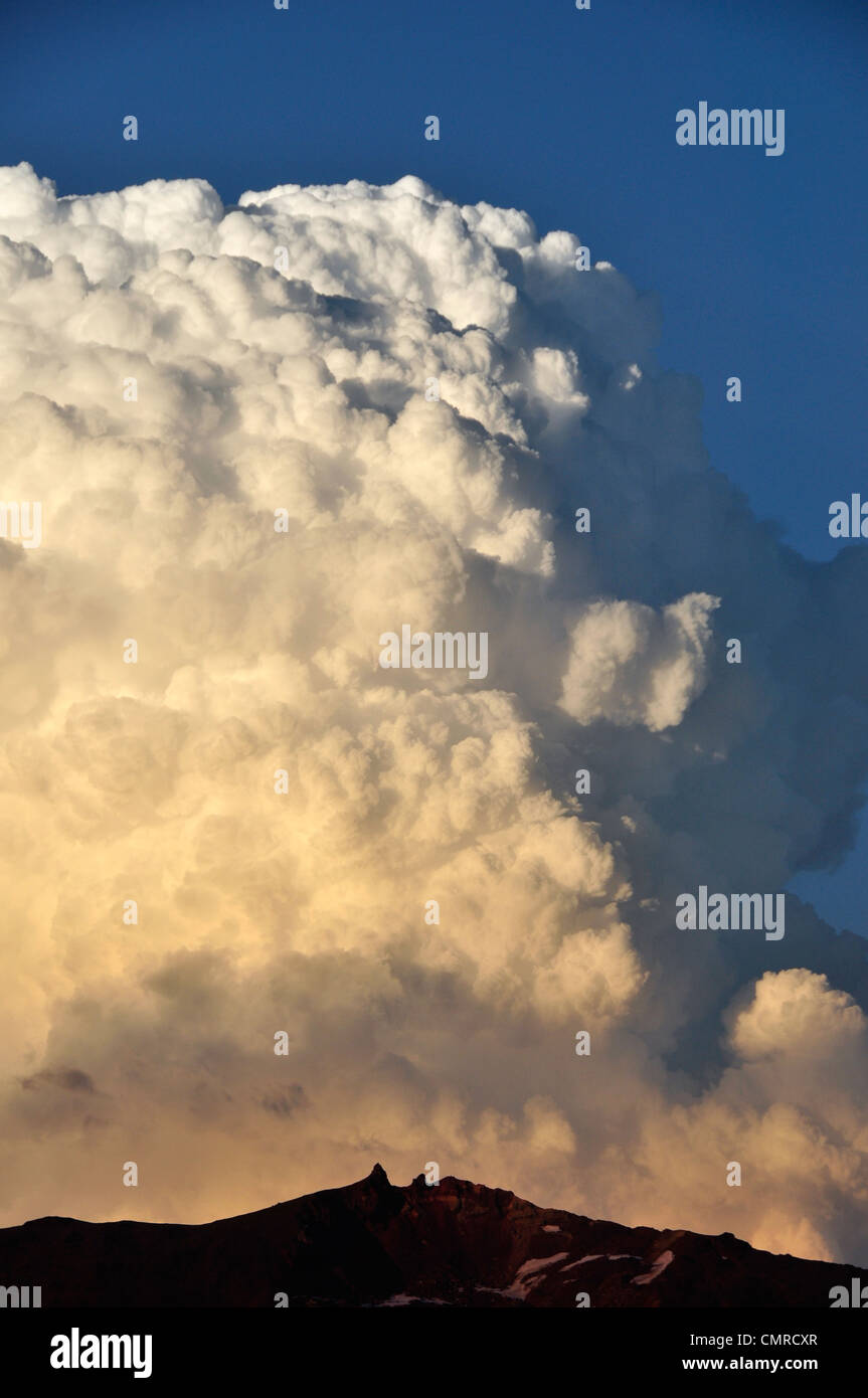 Cumulonimbus over Twin Peaks in Oregon's Wallowa Mountains. Stock Photo