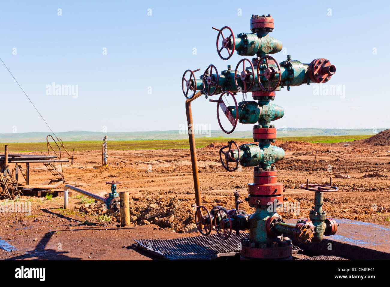 Oil Wellhead in the oil field Stock Photo Alamy