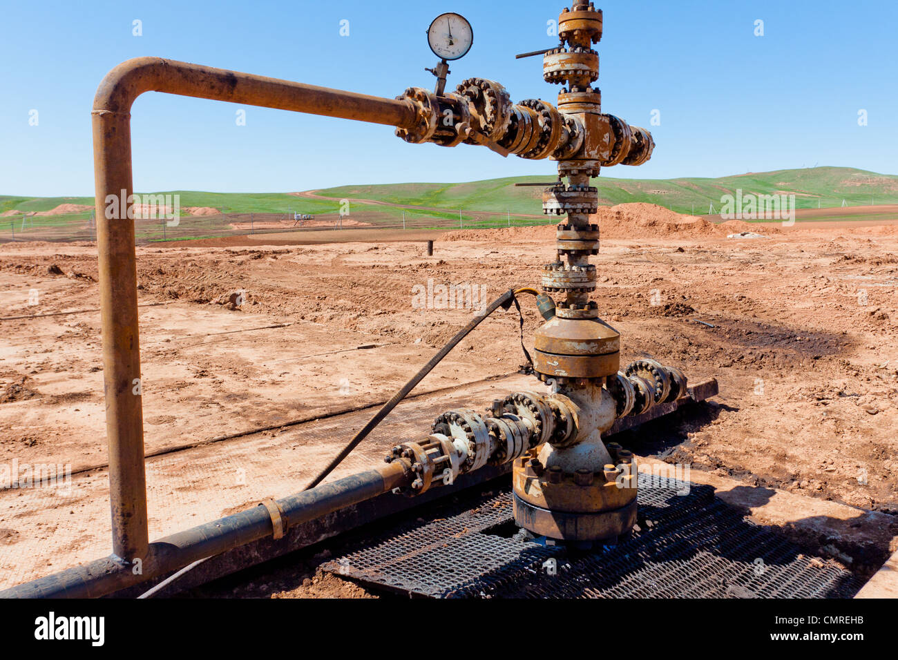Oil Wellhead in the oil field Stock Photo Alamy