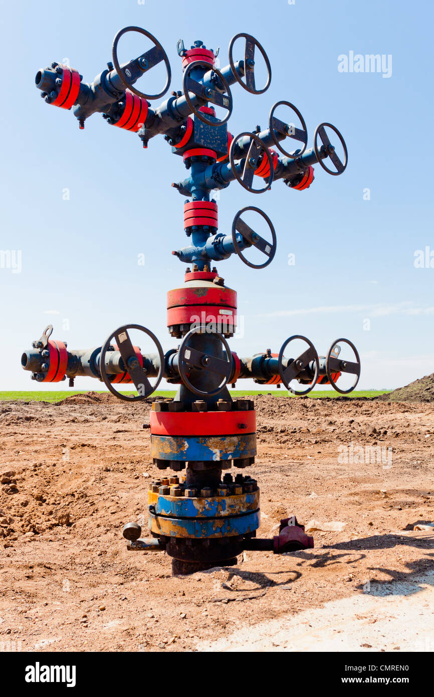Oil Wellhead in the oil field Stock Photo Alamy