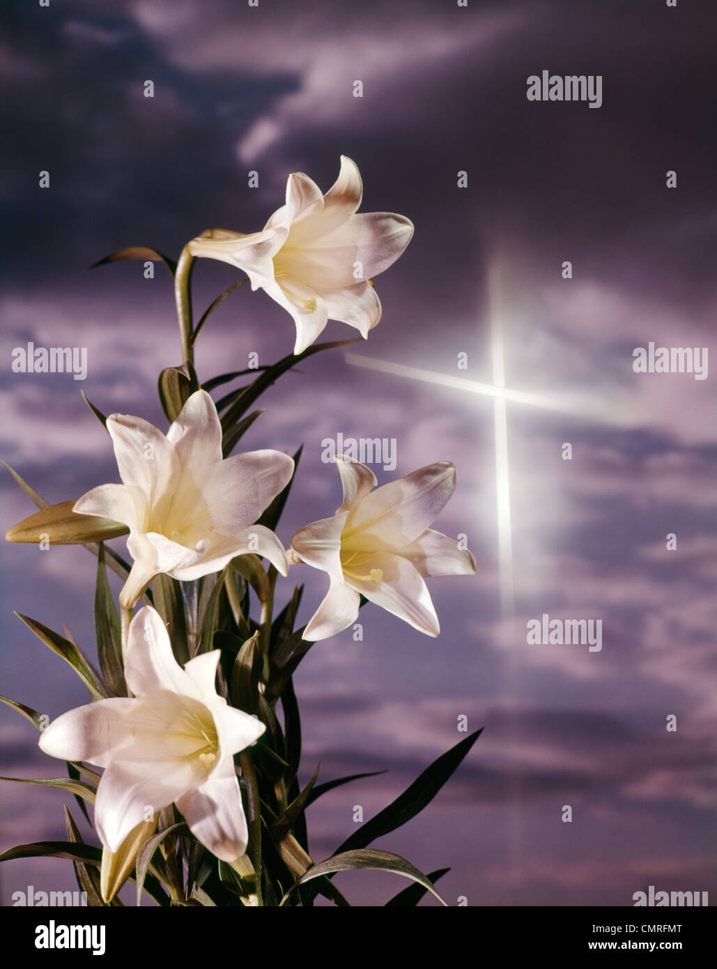 1980s EASTER LILIES WITH SILVER CROSS IN SKY Stock Photo