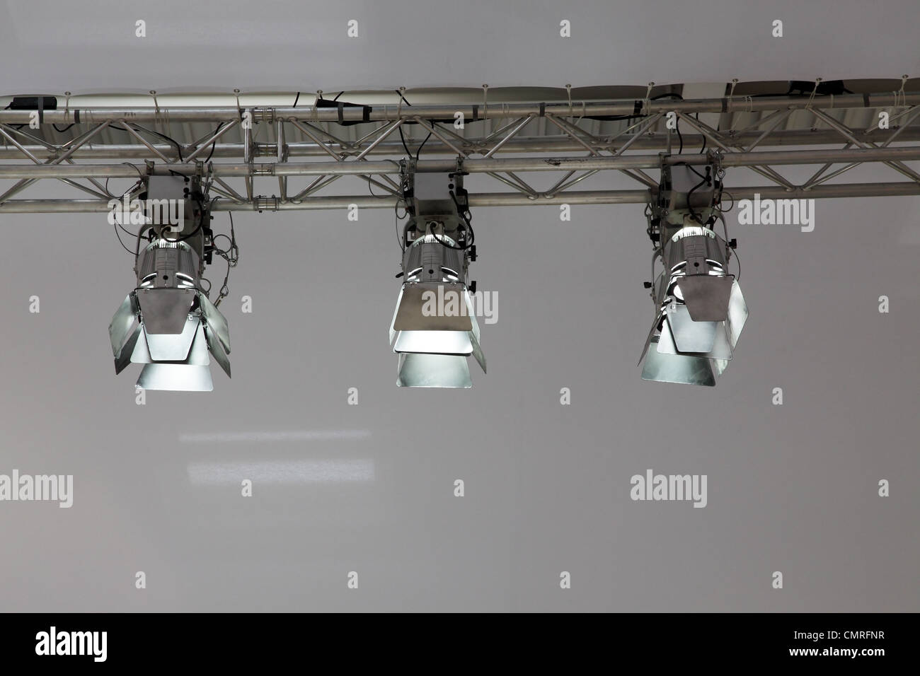 three spotlight on metal frame Stock Photo Alamy