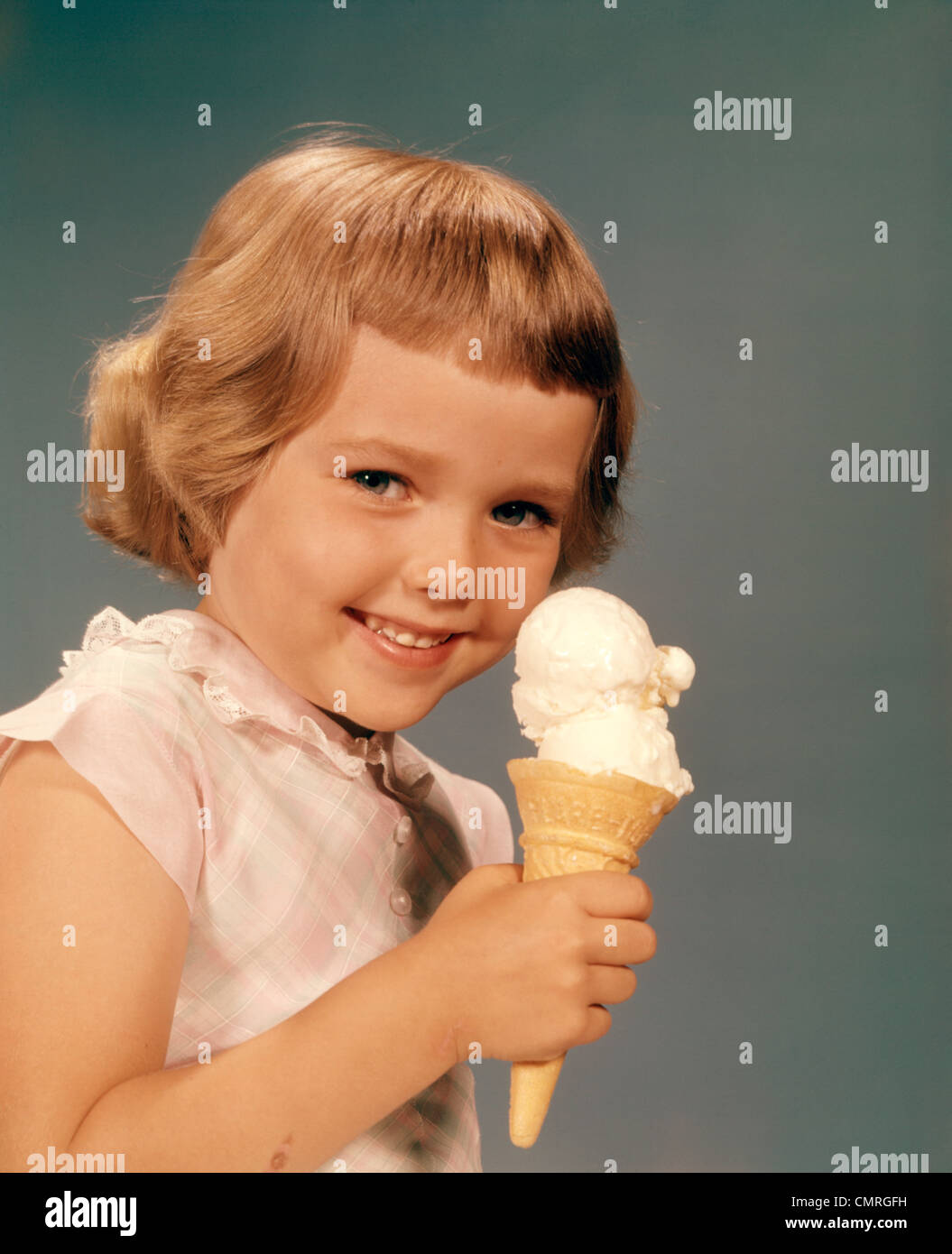 Kids eating ice cream cone 1950s hires stock photography and images
