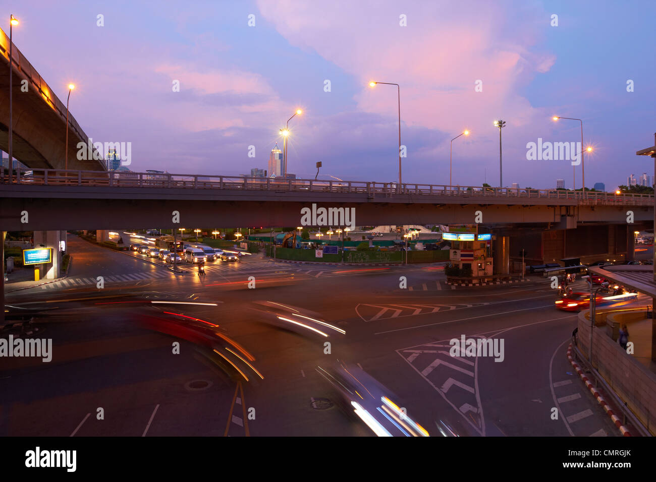 Thailand - Bangkok crossroads and bridge - Night street road traffic Stock Photo