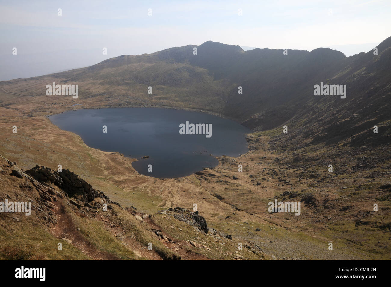 View of Red Tarn and Striding Edge from Swirral Edge, Helvellyn, Cumbria, NW England, UK Stock Photo