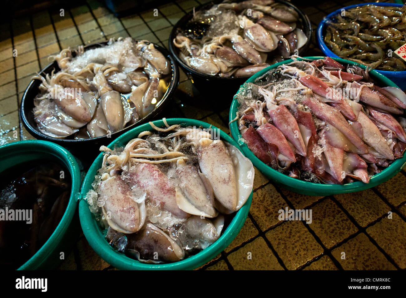 Fresh seafood sits in baskets in the Cubao Farmer's Market, Quezon City
