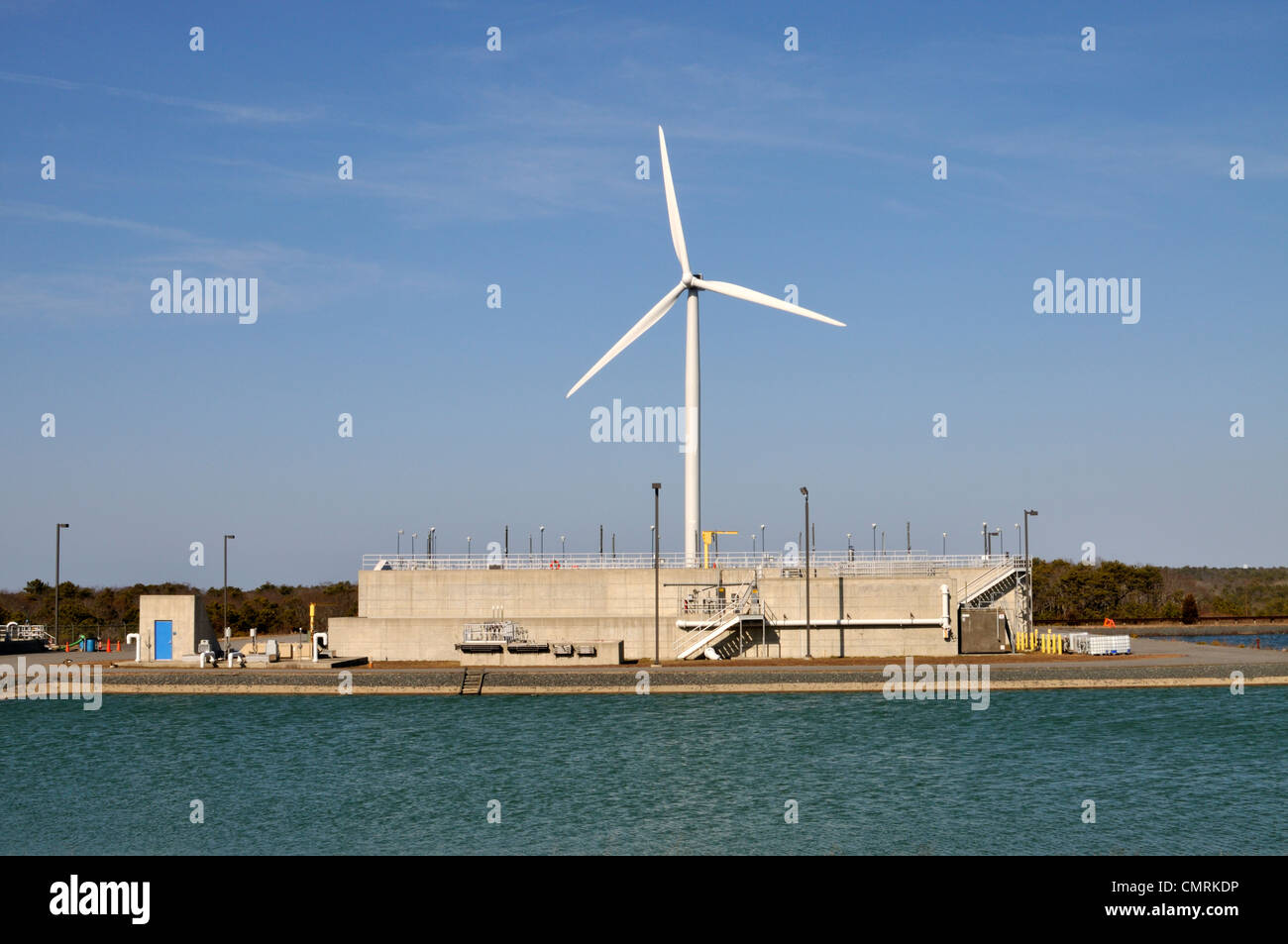 Wind turbine at wastewater treatment facility in Falmouth, Cape Cod, Massachusetts, USA Stock Photo