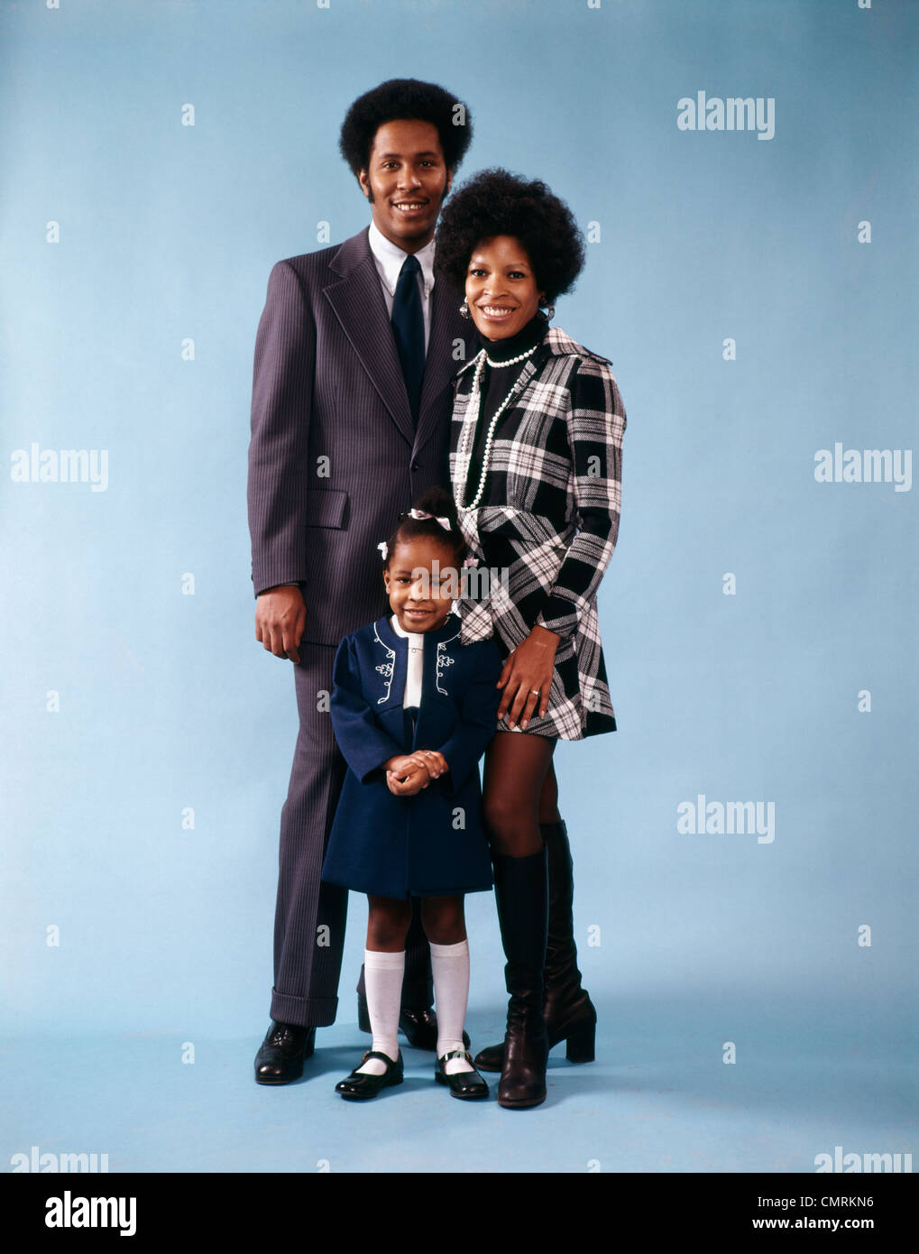 1970 1970s RETRO FAMILY PORTRAIT MOTHER FATHER DAUGHTER BLACK AFRICAN AMERICAN Stock Photo
