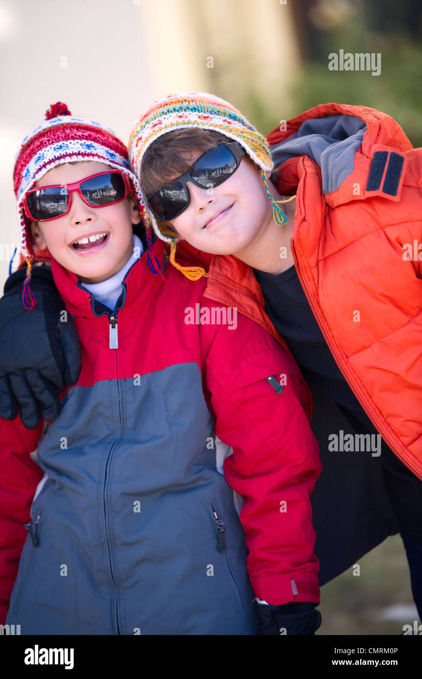 Hispanic boys in cold weather clothing Stock Photo