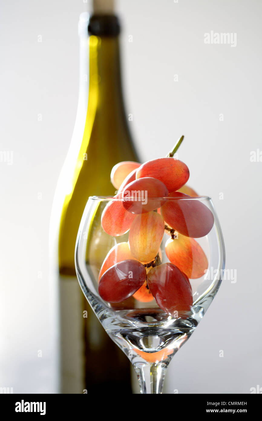 Grapes in wine glass Stock Photo Alamy