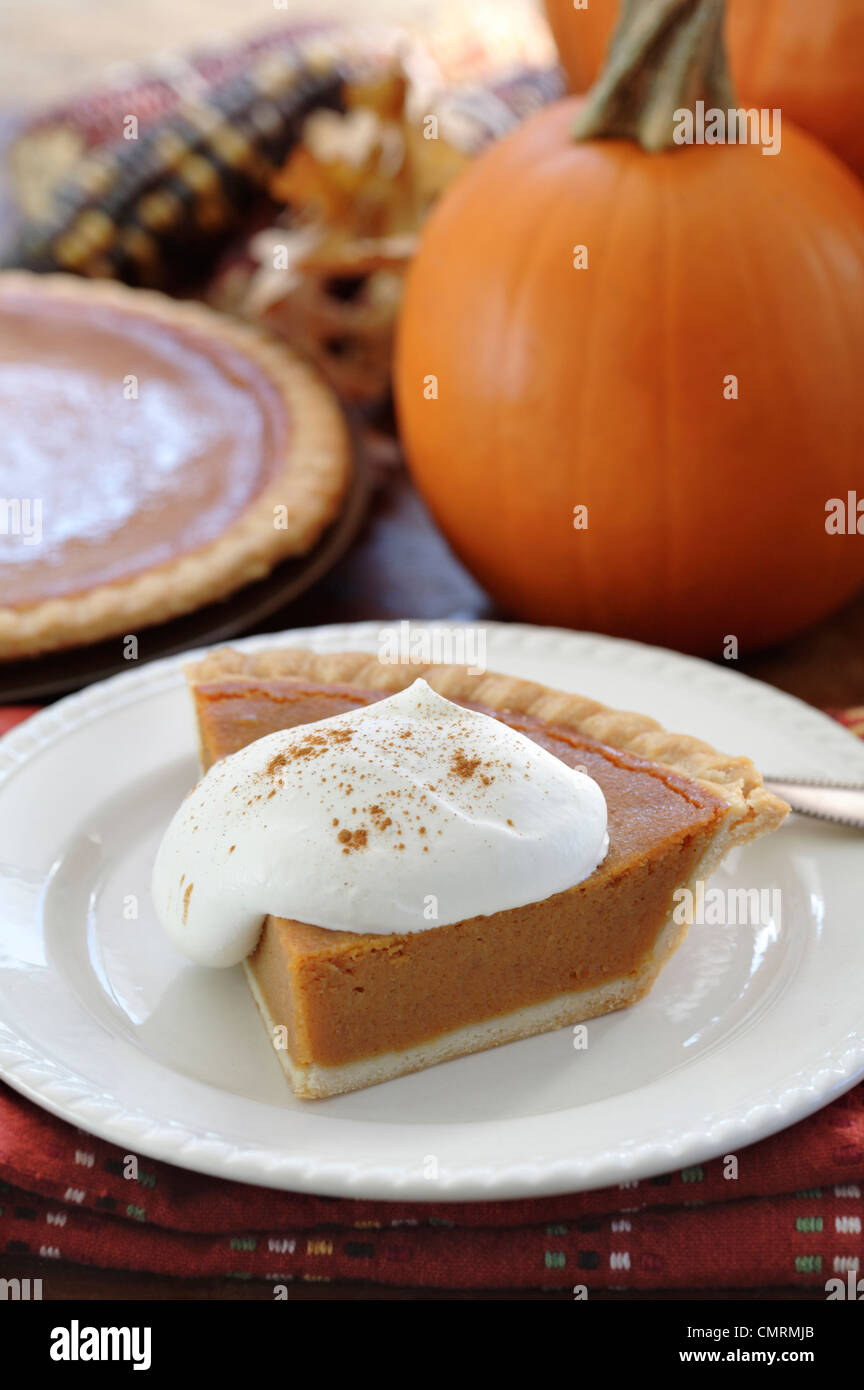 Fresh, homemade pumpkin pie with whipped cream Stock Photo