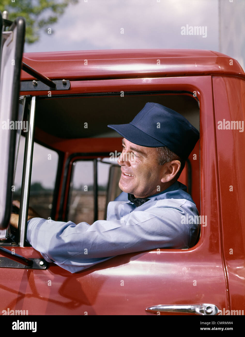 1960 1960s MAN TRUCK DRIVER DELIVERY HAT SMILE Stock Photo - Alamy