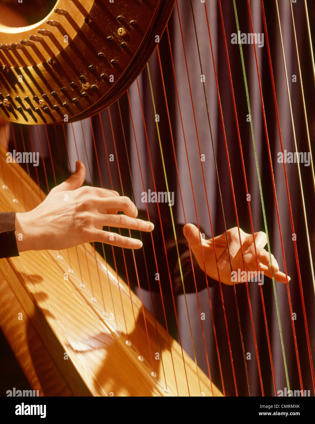 Hands playing harp hi res stock photography and images Alamy