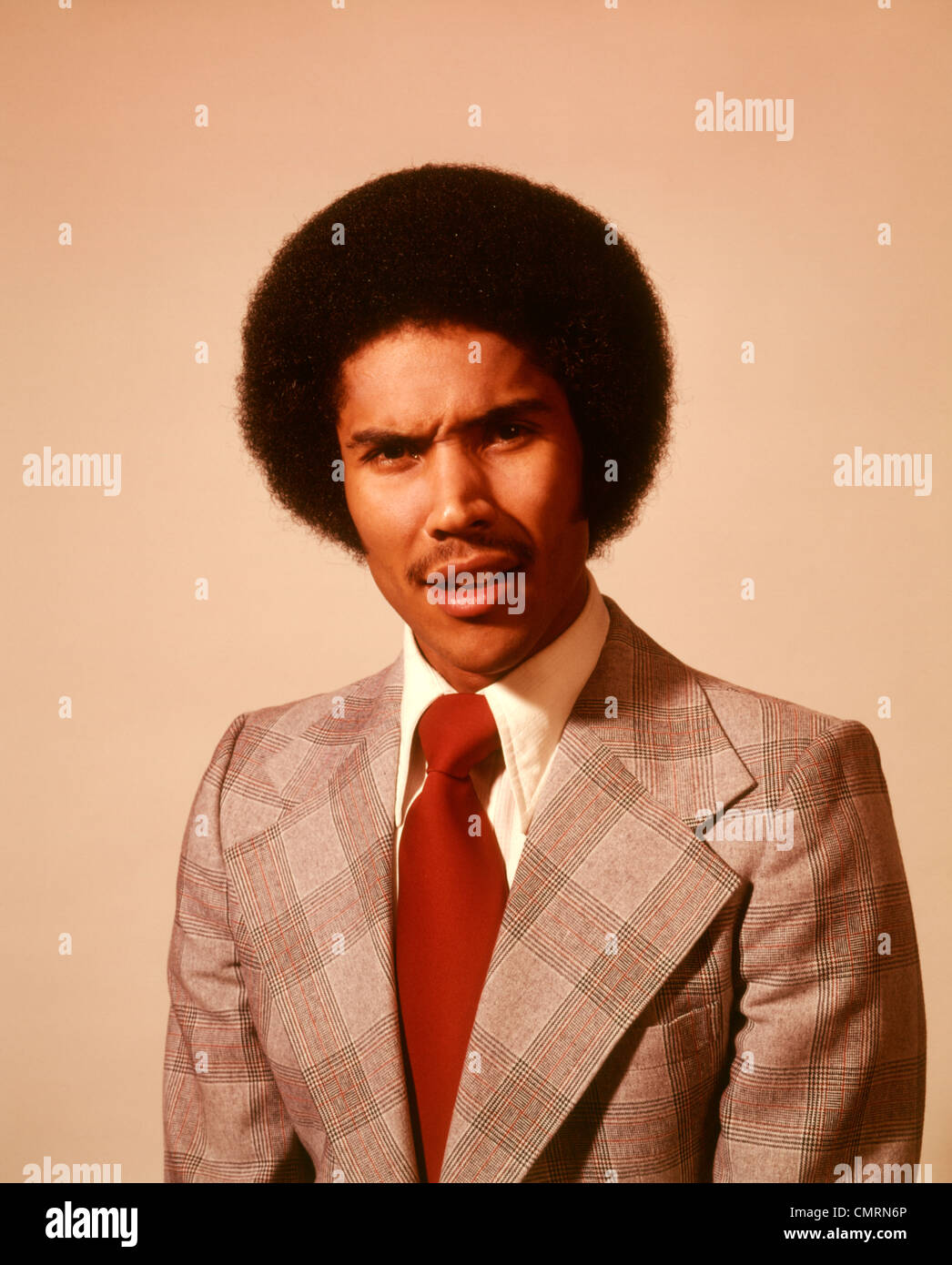 Fine black and white art photography from the 1970s of an African American  man sporting a fantastic soulful seventies afro hairstyle Stock Photo   Alamy