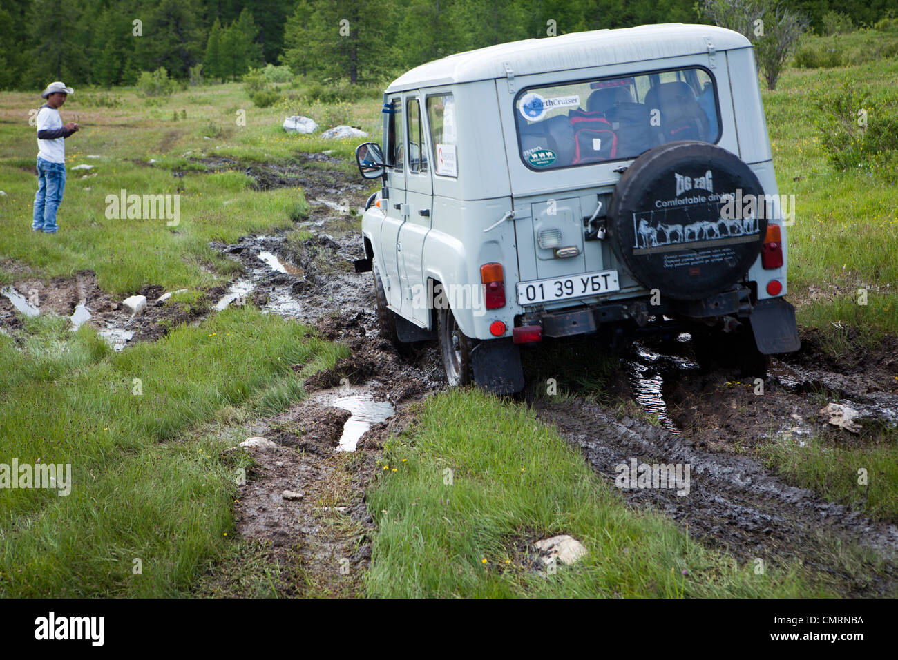 Mongolian jeep is mired in a mud road, Mongolia Stock Photo Alamy