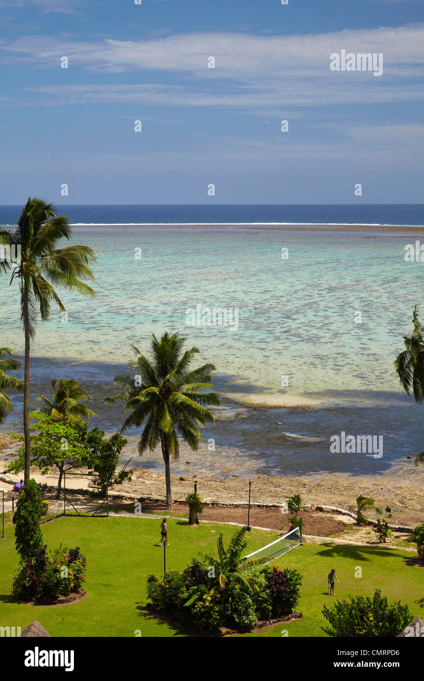 Tennis court, palm trees and coral reef, Crusoe's Retreat, Coral Coast, Viti Levu, Fiji, South Pacific Stock Photo