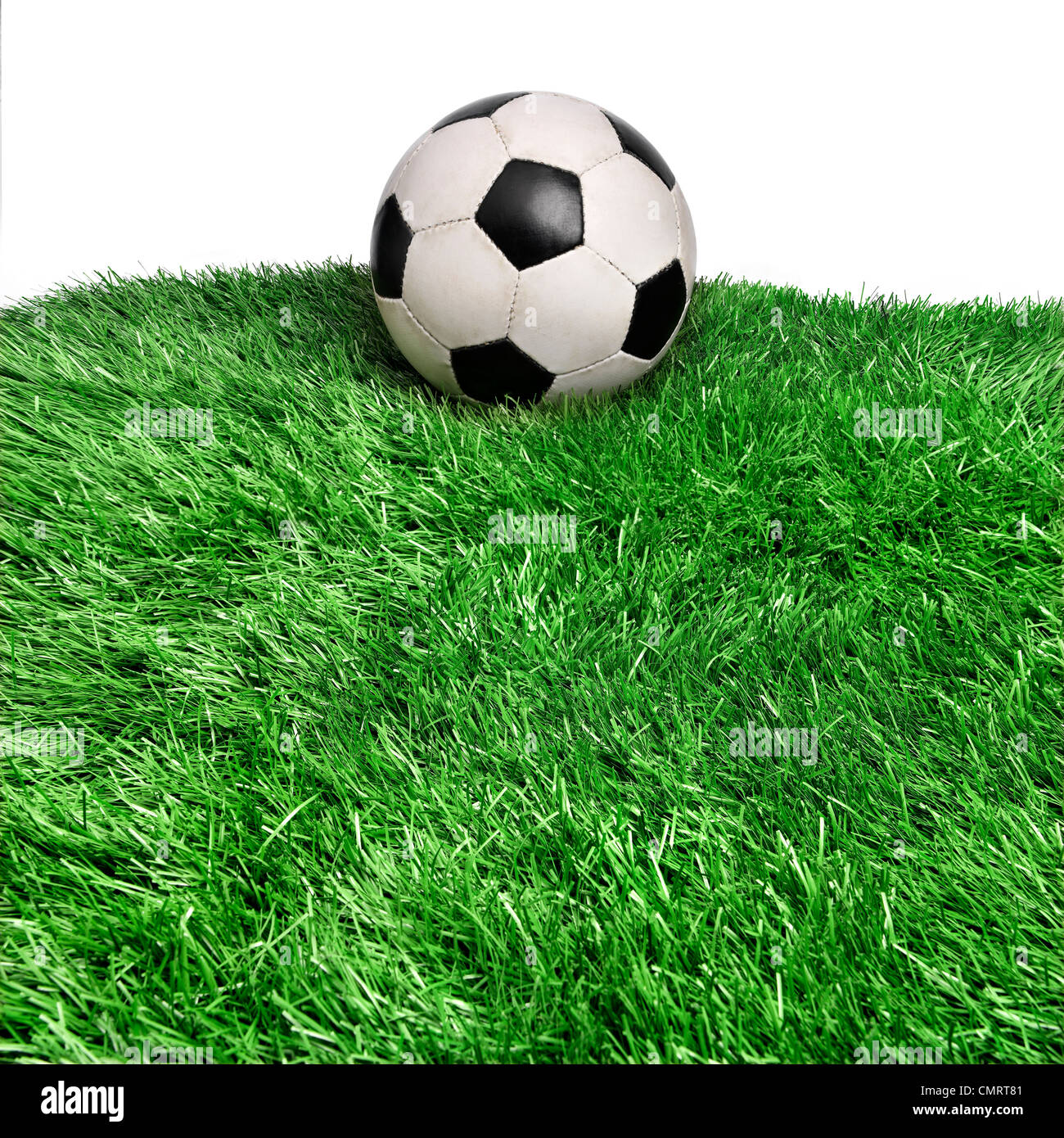 Soccer ball on grass field Stock Photo Alamy